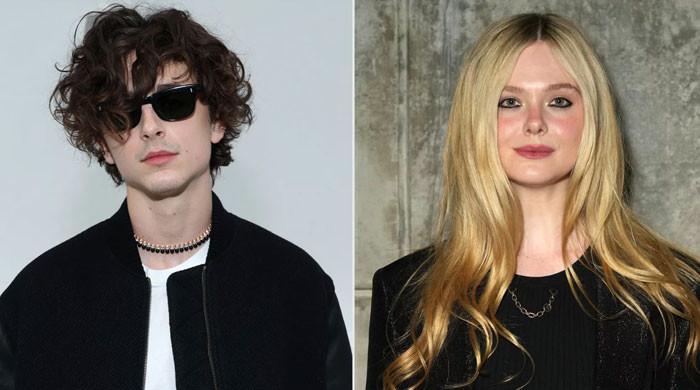 elle-fanning-gets-emotional-watching-timothee-chalamet-sing-as-bob-dylan