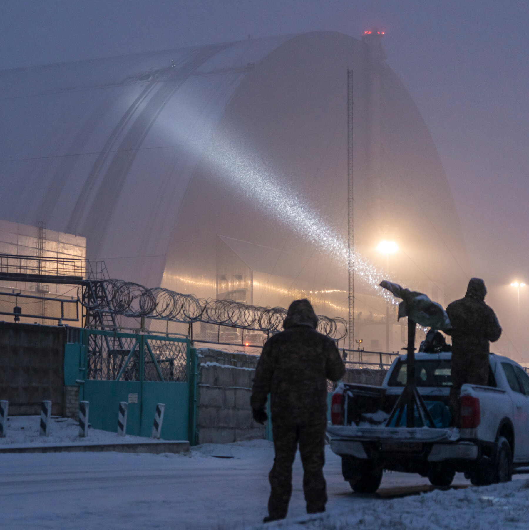 high-above-chernobyl,-workers-grapple-with-ice,-fire-and-nuclear-fears